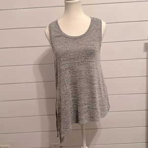 Woman’s Market & Spruce A Symmetrical Tank